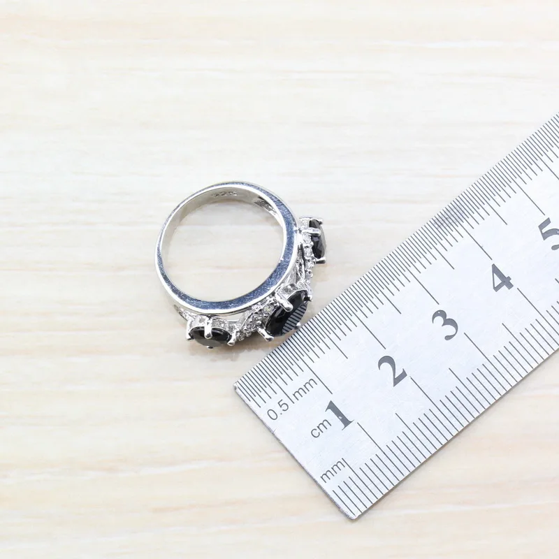 Женские вечерние серьги серебристого цвета длинные висячие