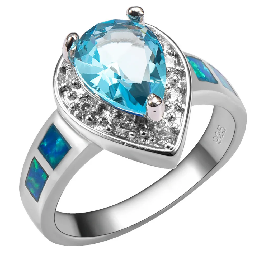 

Кольцо женское из серебра с имитацией аквамарина и голубым огненным опалом