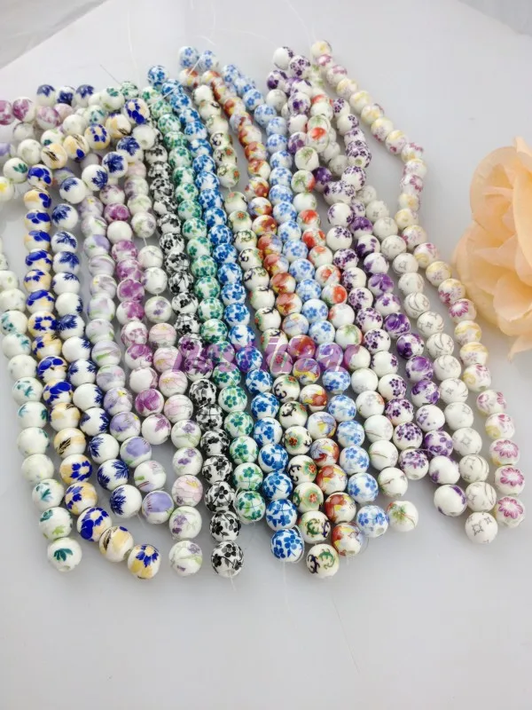 

Free shipping 10-14mm 100pcs/lot Ceramic Porcelain Flower Round Beads,Handpainted Random Mixed design Flower Loose Spacer Beads