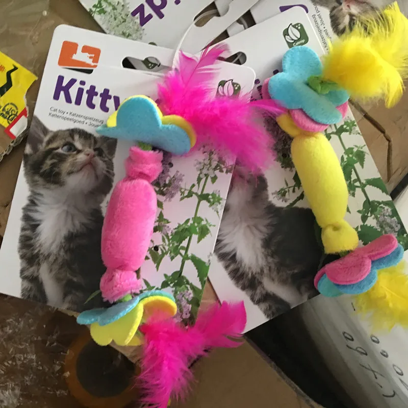 

usd0.8/pc wholesale price cat kitten toys feather sugar soft material with catnip two colors 30pcs/lot