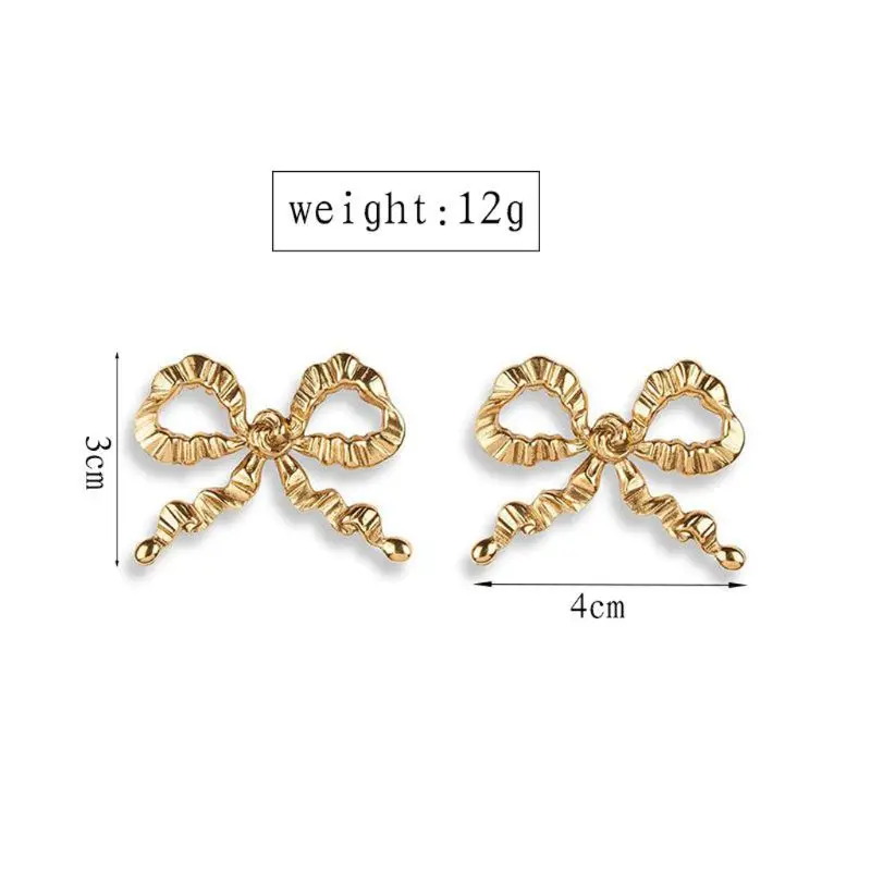 Летние золотые глянцевые Большие текстурированные серьги-гвоздики с бантом для