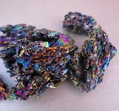 Натуральный красочный изысканный павлин руда nunatak drupelets150g/Лот Бесплатная
