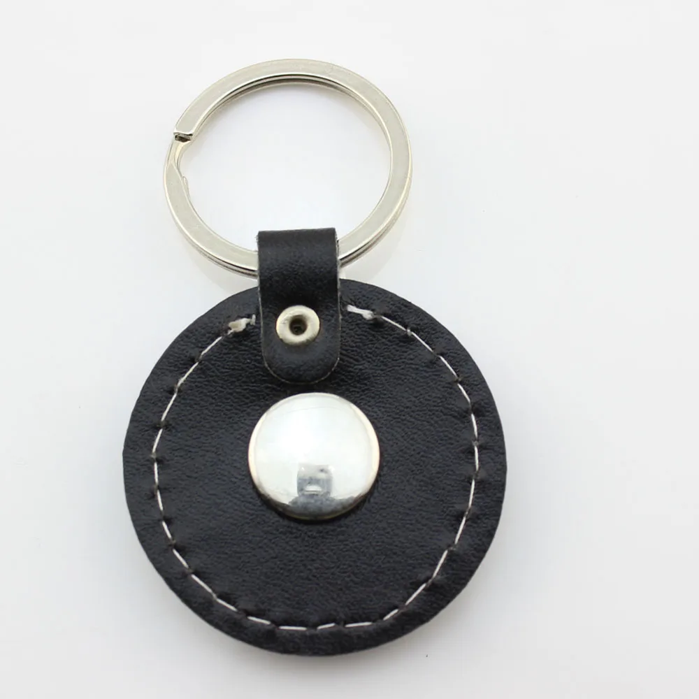 1 шт./лот 2017 черный настоящий кожаный брелок с кнопкой для ключей мужчин и женщин 18