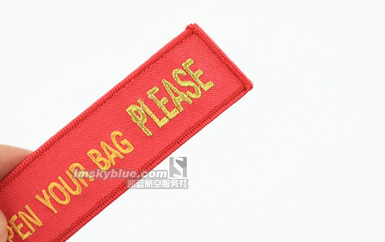 Проверка безопасности пожалуйста откройте свою сумку ярлык с сумкой багаж