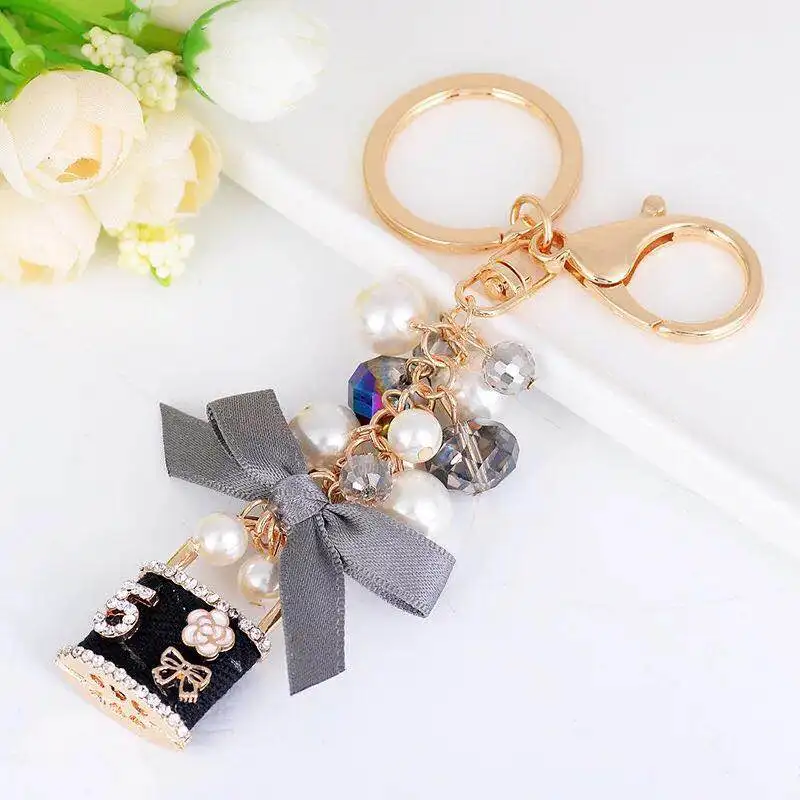 New pearl bow key chain personalized lock crystal ring car chains female bag pendant accessories keychain Дом и сад