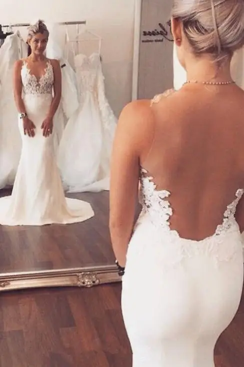 

Ivory Appliqued Mermaid Wedding Dress Long See Through Sleeveless Beach Wedding Dress