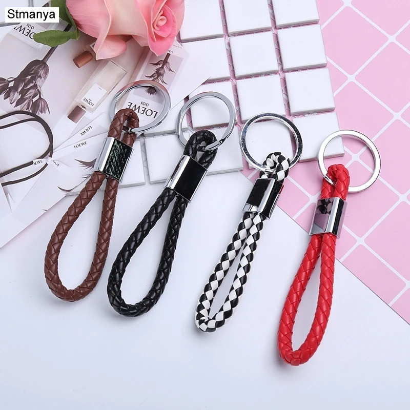

New alloy Key Chain Handmade woven leather rope Keychain Fashion pendant Bag Charms Accessories Simple Car Key Holder K1704