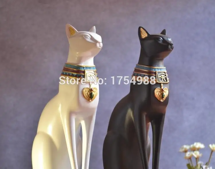 Вращайте статую Бога кошки превратите кошку в позицию справа Откройте замок