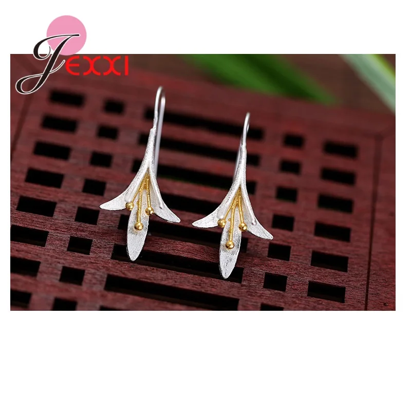 Уникальные серебряные серьги цвета розового золота стильные яркие женские в