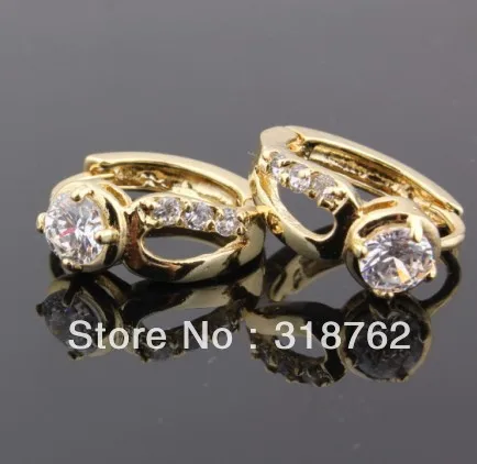 Модные ювелирные серьги женские гвоздики с фианитом желтого золота 18 карат