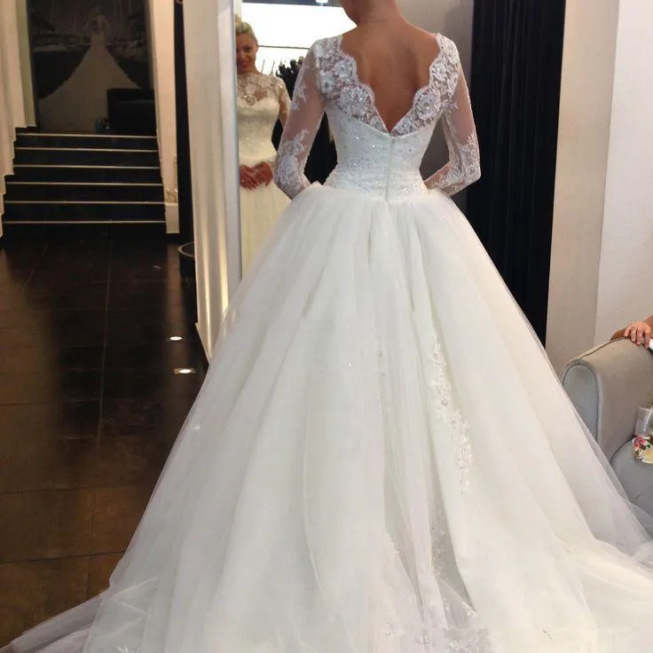 

Stunning Iovry Tulle Sheer Wedding Dresses with Long Sleeves vestido de noiva Backless Lace AppliquesSequins Formal Bridal Gowns