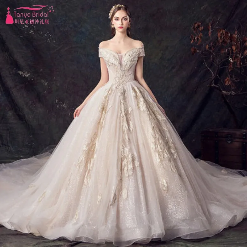 

TANYA BRIDAL Real Image Elegant Off the Shoulder Appliqued Lace Short Sleeve Puffy Ball Gown Wedding Dresses DQG847