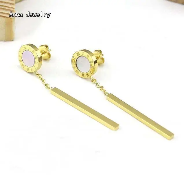 Винтажные дизайнерские длинные висячие серьги круглые с белым и черным корпусом