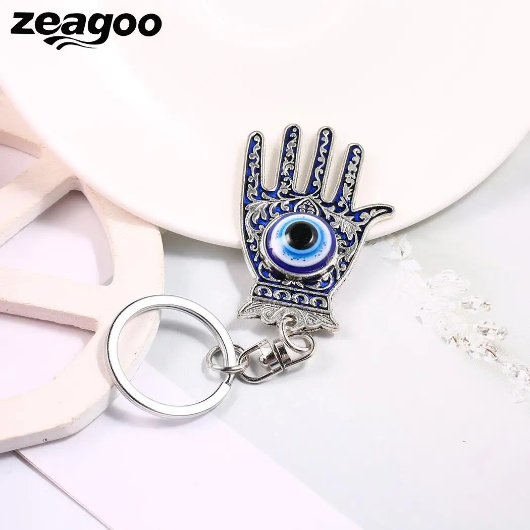 Ручной ключевой мешок Резные кольцо украшение глаза брелок синий Форма