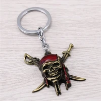 julie 12pcslot 2 colors pirates of the caribbean keychain captain jack sparrow mask skull with crossbones key holder chaveiro