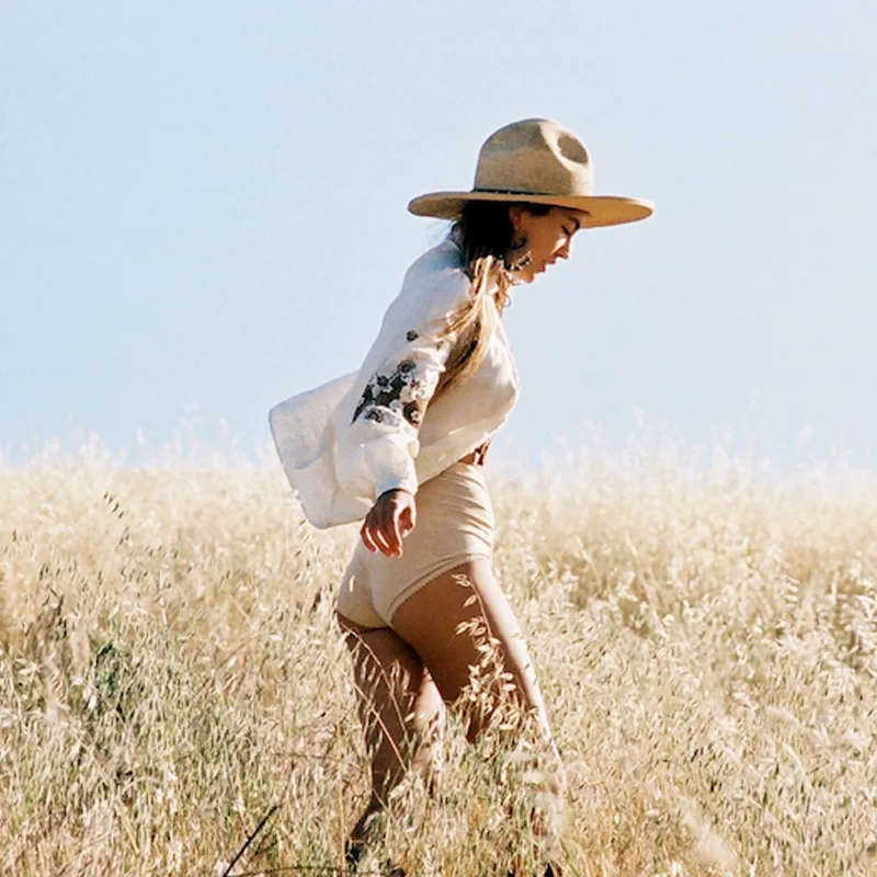 Женская блузка с вышивкой белая свободная хлопковая длинным рукавом