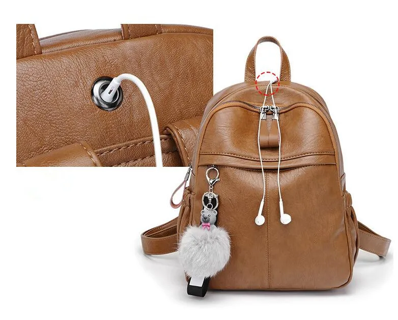 Leather shoulder bag female tide new trend explosion models student backpack leisure travel luggage to send bear ornaments |