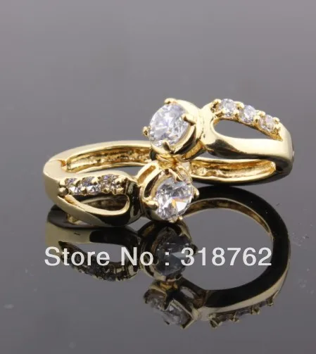 Модные ювелирные серьги женские гвоздики с фианитом желтого золота 18 карат