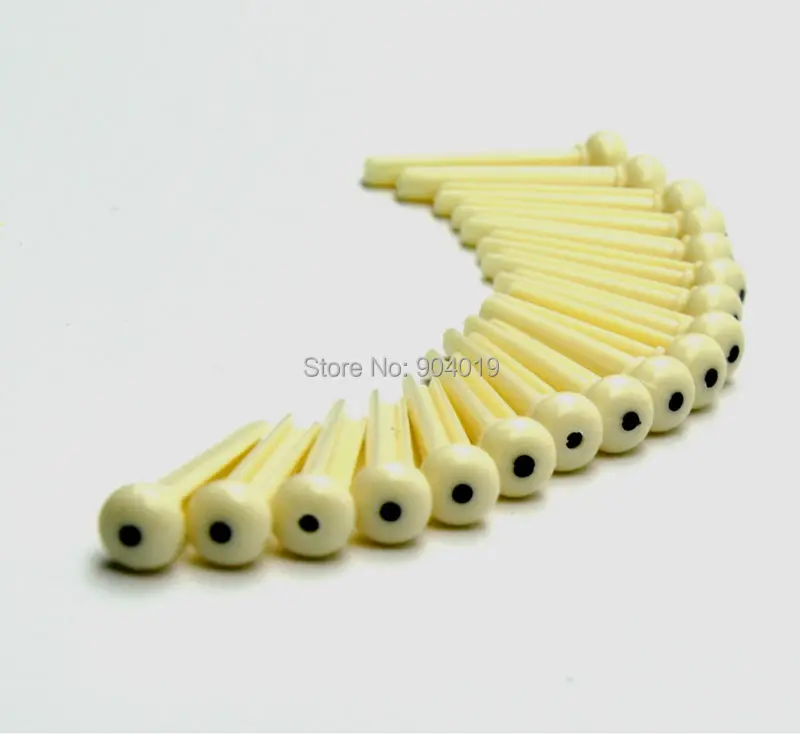 

Lots of 100pcs Universal Acoustic Guitar Bridge Pins Plastic Ivory White