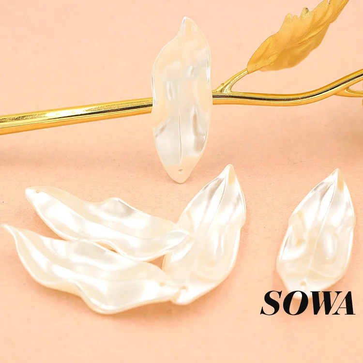 

Free Shipping 100Pcs 50*18mm Ivory Craft ABS Resin Imitation Pearls Leaf Effect 3D Maple Designed Beads For DIY Jewelry Making