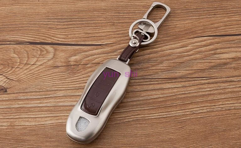 Высококачественный чехол для автомобильных ключей из цинкового сплава и кожи