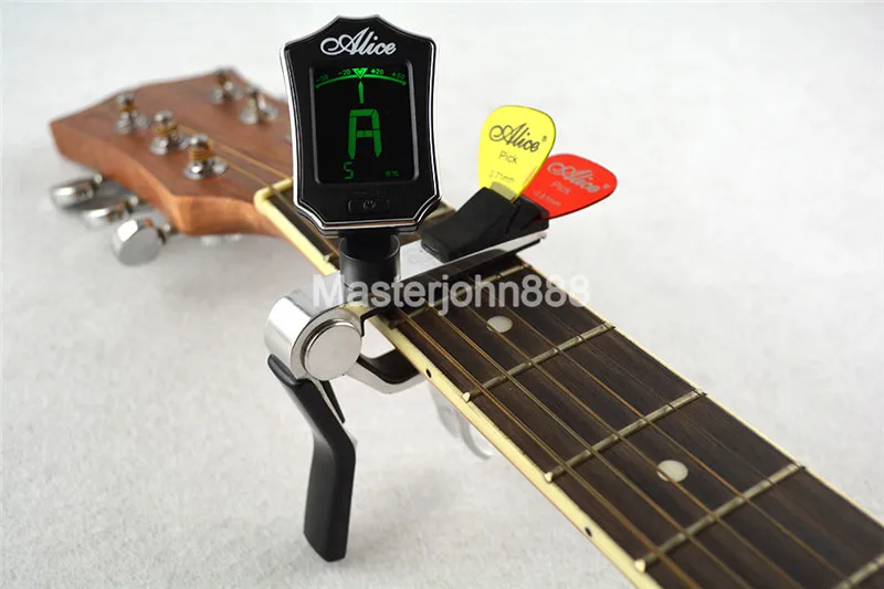 

Alice Multifunctional Guitar Tuner Capo Pick Holder For Acoustic Electric Guitar Clamshell Package