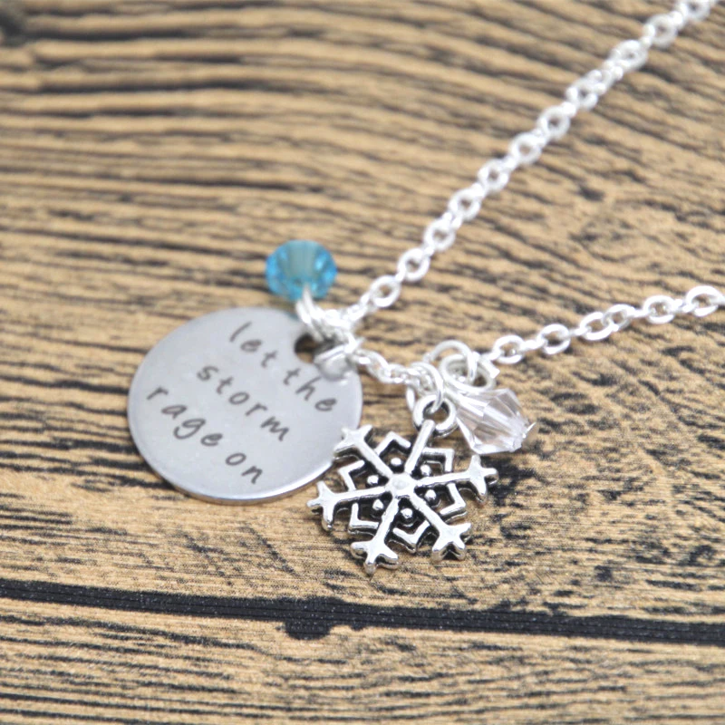 

12pcs/lot Necklace Let The Storm Rage On Let It Go Crystals. Snowflakes