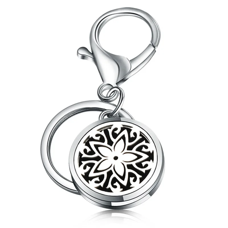 

Charm High Quality Perfume Key Chain Five-Pointed Star Flower Stainless Steel Essential Oil Diffuser Perfume Aromatherapy Locket