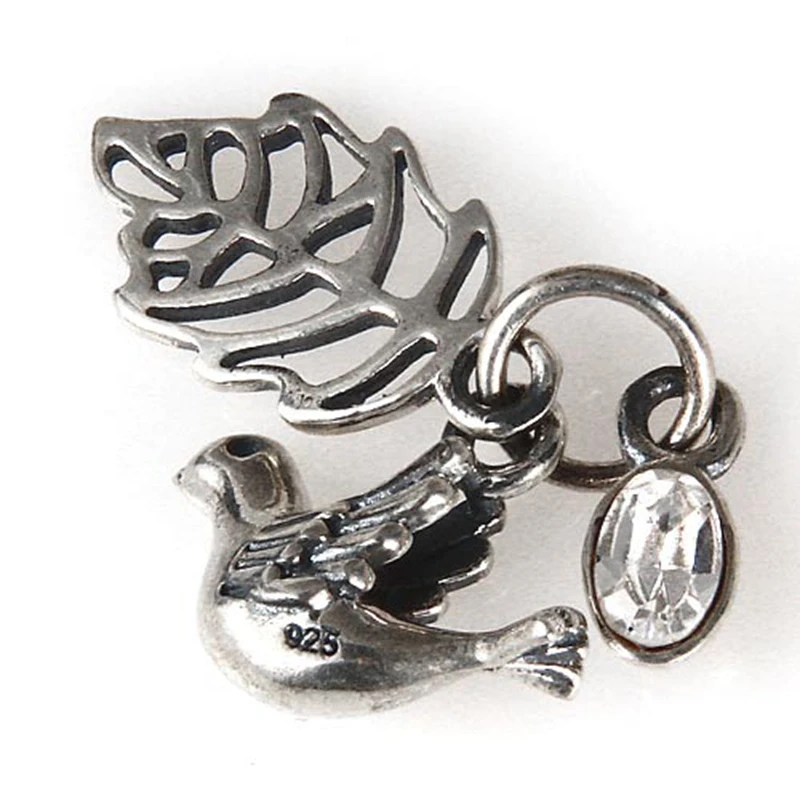 Подвеска-Голубь из серебра 100% пробы с австралийским хрустальным яйцом |