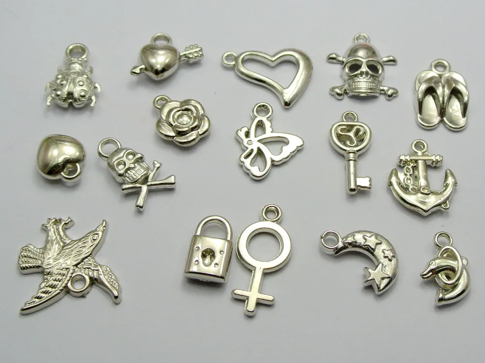 

100 Assorted Silver Tone Metallic Acrylic Charm Pendants Flower Key Anchor