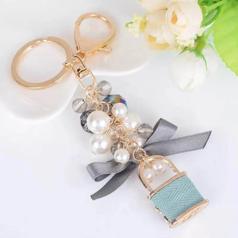New pearl bow key chain personalized lock crystal ring car chains female bag pendant accessories keychain Дом и сад