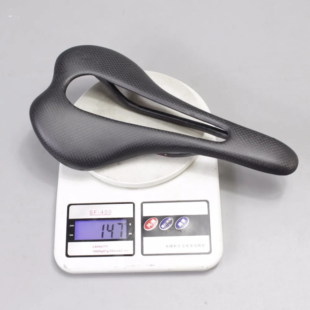 

2018 new MTB hollow cushion full carbon saddle road bike seat bicycle parts 275 * 147mm 3K carbon road saddle