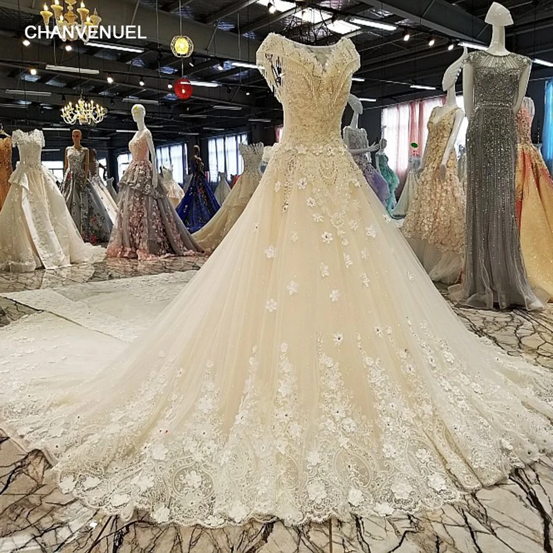 LS00302 свадебное платьебез спинки крышка рукава большой лук назад кружева бальное