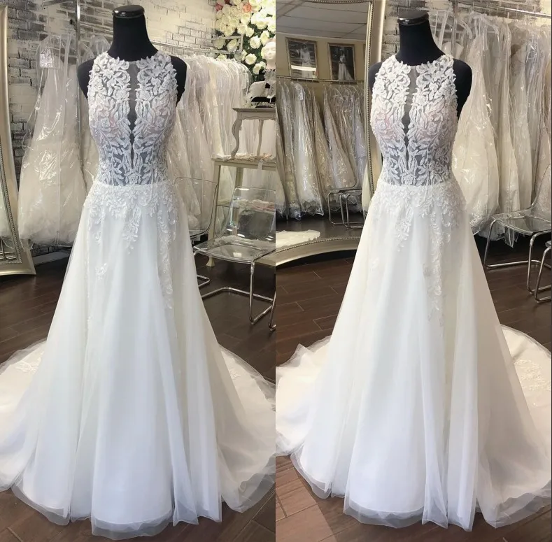 

Новинка 2020 Свадебные платья кружевные аппликационные Блестки без рукавов на пуговицах свадебные наряды реальные изображения ТРАПЕЦИЕВИДН...