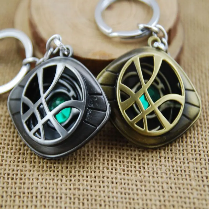 

[Funny] 30pcs/lot super hero Doctor Strange Eye of Agamotto figure metal model bag key chain pendant toy gift