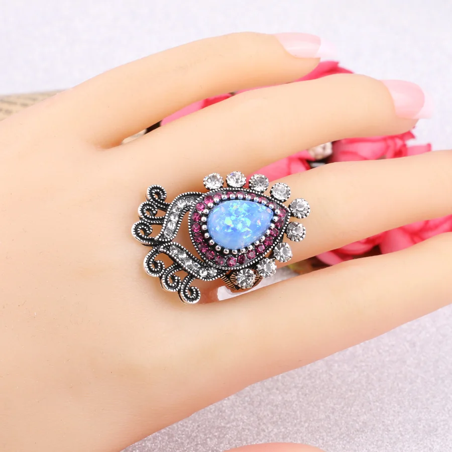 Женские кольца с голубым опалом белый цветок со стразами серебряное кольцо