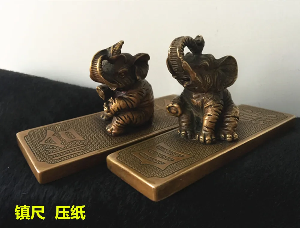 

The copper brass elephant paper weight paper pressing coppe.