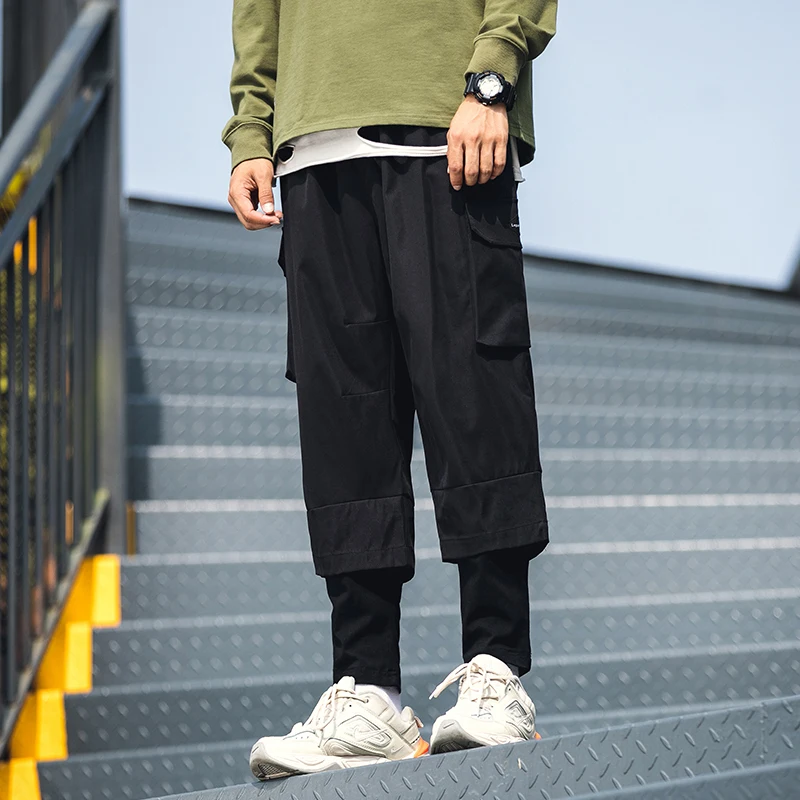 Новинка осени 2019 модные мужские брюки имитация двух частей черные длина по