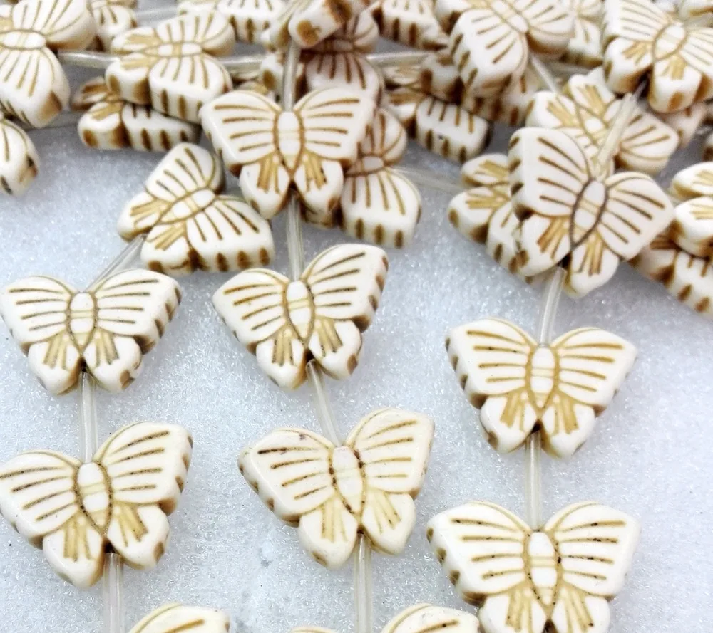 

Total 15 pcs beads 20x28mm Bright white bead carved Pretty butterfly howlite stone Loose Beads