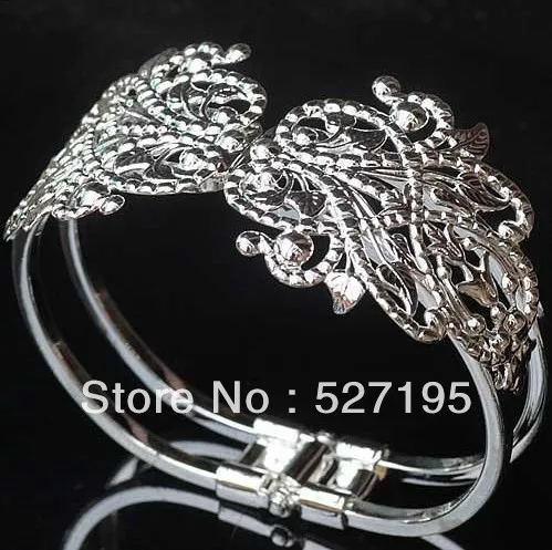 

Free shipping, fashionable silver-plated hollow flower bracelet diameter 65mm bracelet