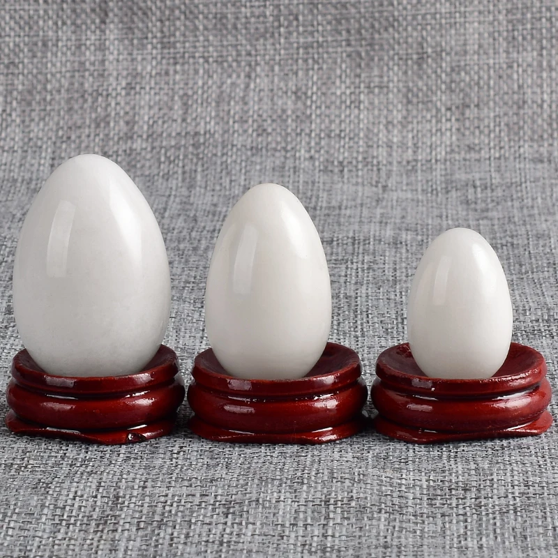

Gemstone Natural white jade egg with wooden base feng shui mineral quartz crystals Healing Balls for massage Chakra Reiki sphere