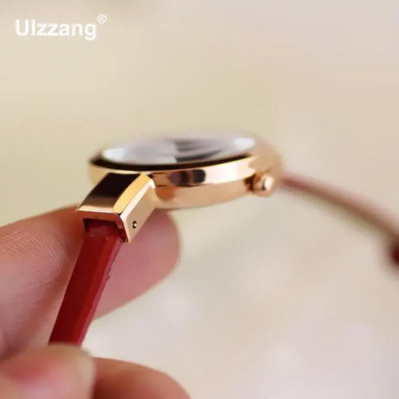 Женские кварцевые часы Yuhao с тонким кожаным ремешком и стразами розовое золото