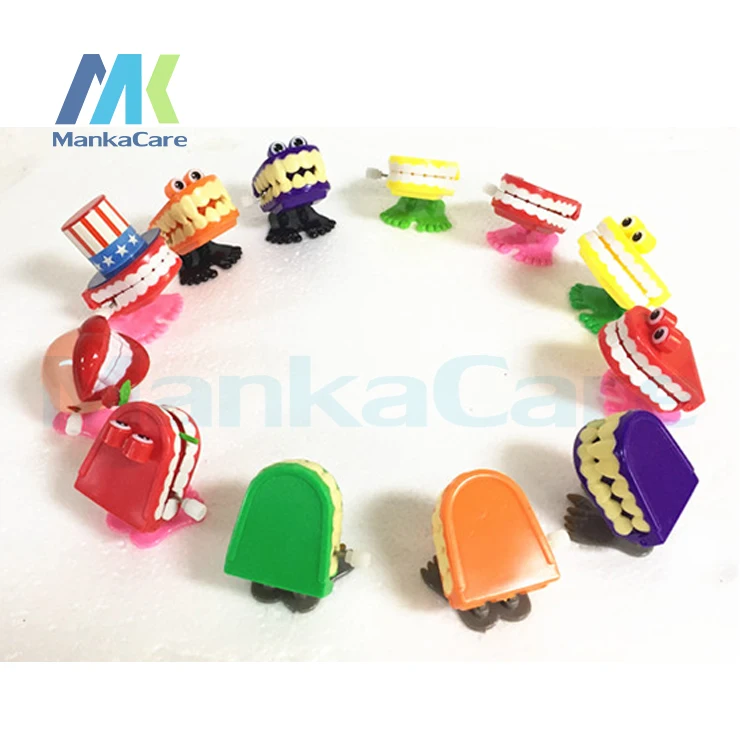 100 Pcs Funny Chattering Jumping Walking Teeth Shape Clockwork Toy Mini Children Christmas Animal Tooth Toys Gifts Wind Up Toys