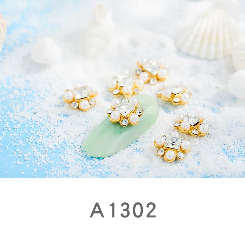 A1302(100pcs) 100 шт ногтей ювелирные изделия горный хрусталь жемчуг лук ногтей дрель ногтей сплав аксессуары - Цвет: A1302(100pcs)