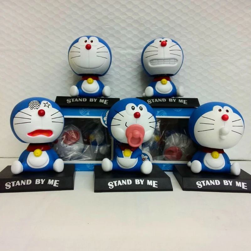Doraemon Jingle кошачья качающаяся голова соска улыбка тряска робот кошка автомобиль