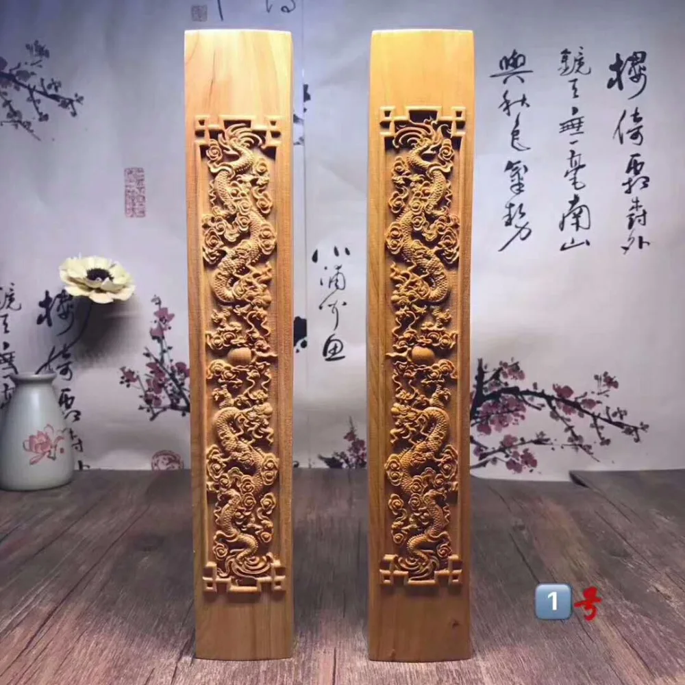 

The new Phoenix arborvitae wood meilanzhuju Paperweight carved high oil old material.