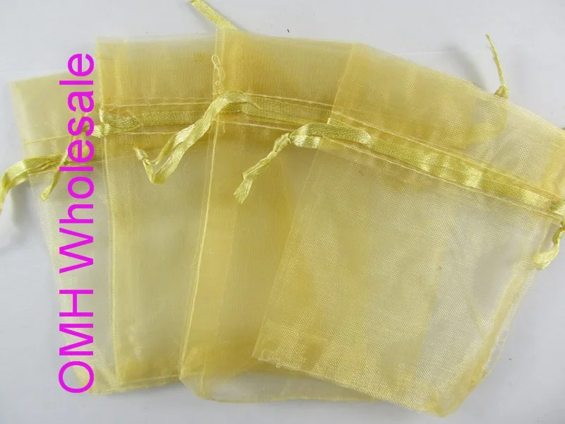 

OMH wholesale 50pcs 7x9,10x12,10x15,11x16,15x20,17x23,13x18cm golden Christmas Packaging bags jewelry voile gift bag BZ08-11