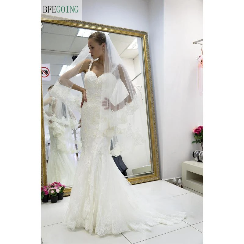 

Ivory Appliques Lace Floor-Length Mermaid /Trumpet Wedding dresses Chapel Train Spaghetti Straps Bridal Gown