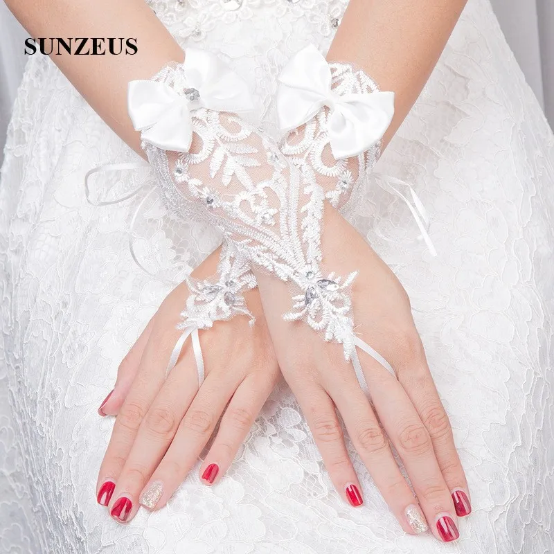 

Fingerless Gloves Short White Lace Wedding Gloves with Beaded Bow Top Back Lace Up Bride Gloves for Women SG07