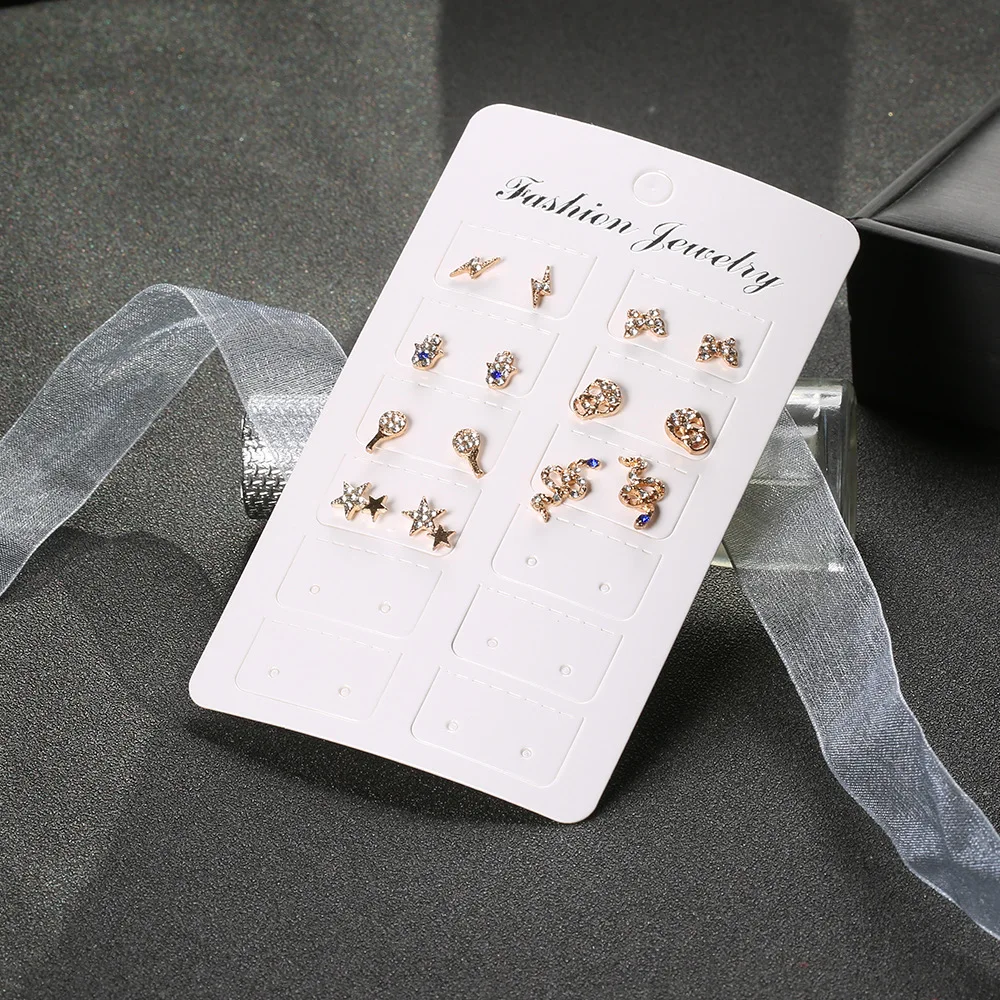 Набор сережек из 7 пар: Бохо-кристаллы, звезды, бабочки, ключи, черепа, руки, змеи. Женские панк-серьги-шпильки с индивидуальностью для вечеринки, ювелирные украшения в подарок.